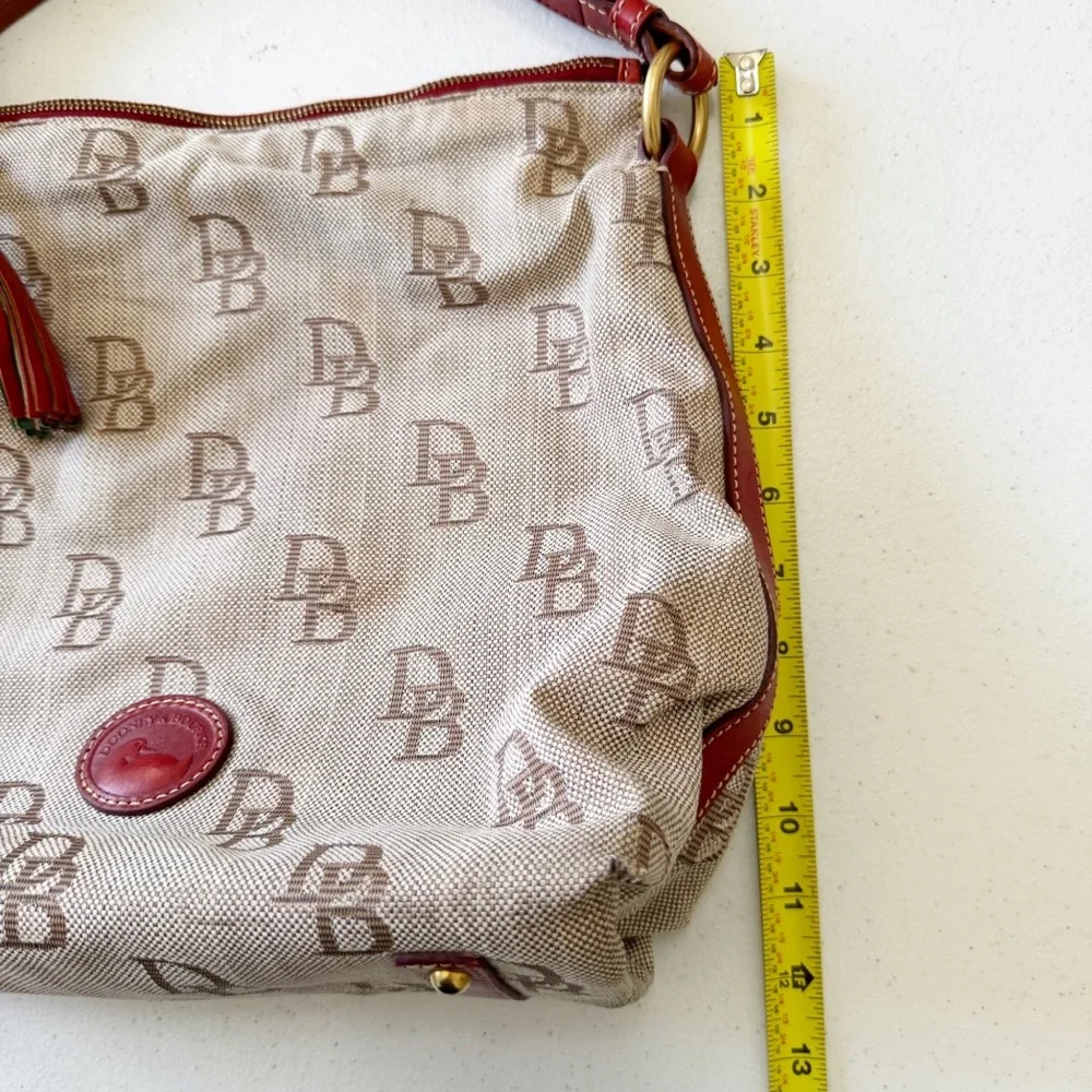 Dooney & Bourke Jacquard Logo Cream Red Tassel Hobo Bag